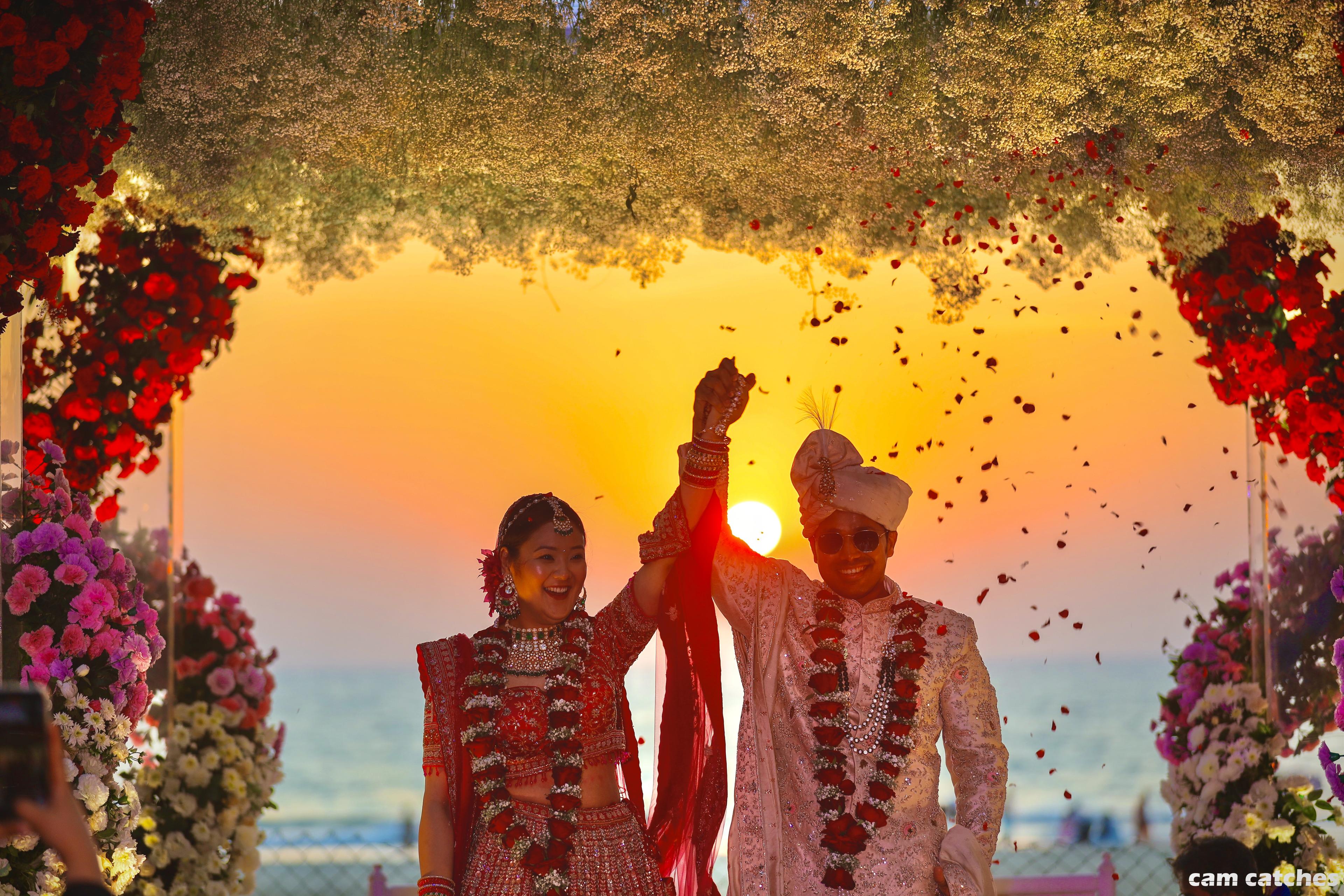A stunning Indian wedding ceremony setup with elaborate floral decorations.